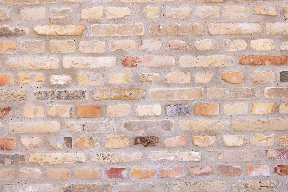 Genbrugsmursten facade gul